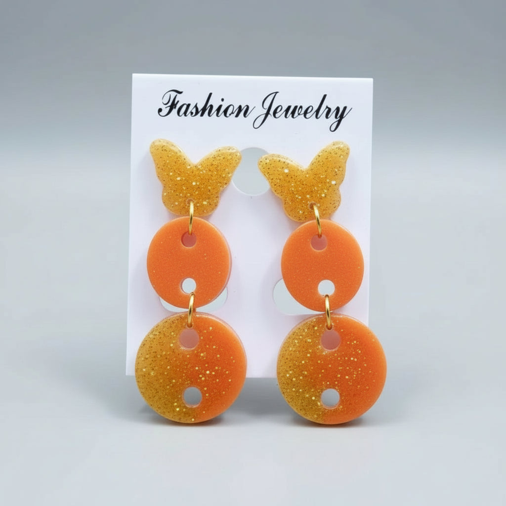 Orange and gold butterfly-shaped earrings 