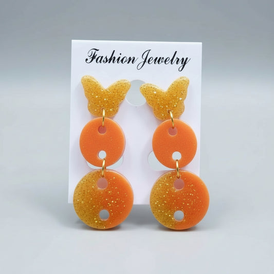 Orange and gold butterfly-shaped earrings 